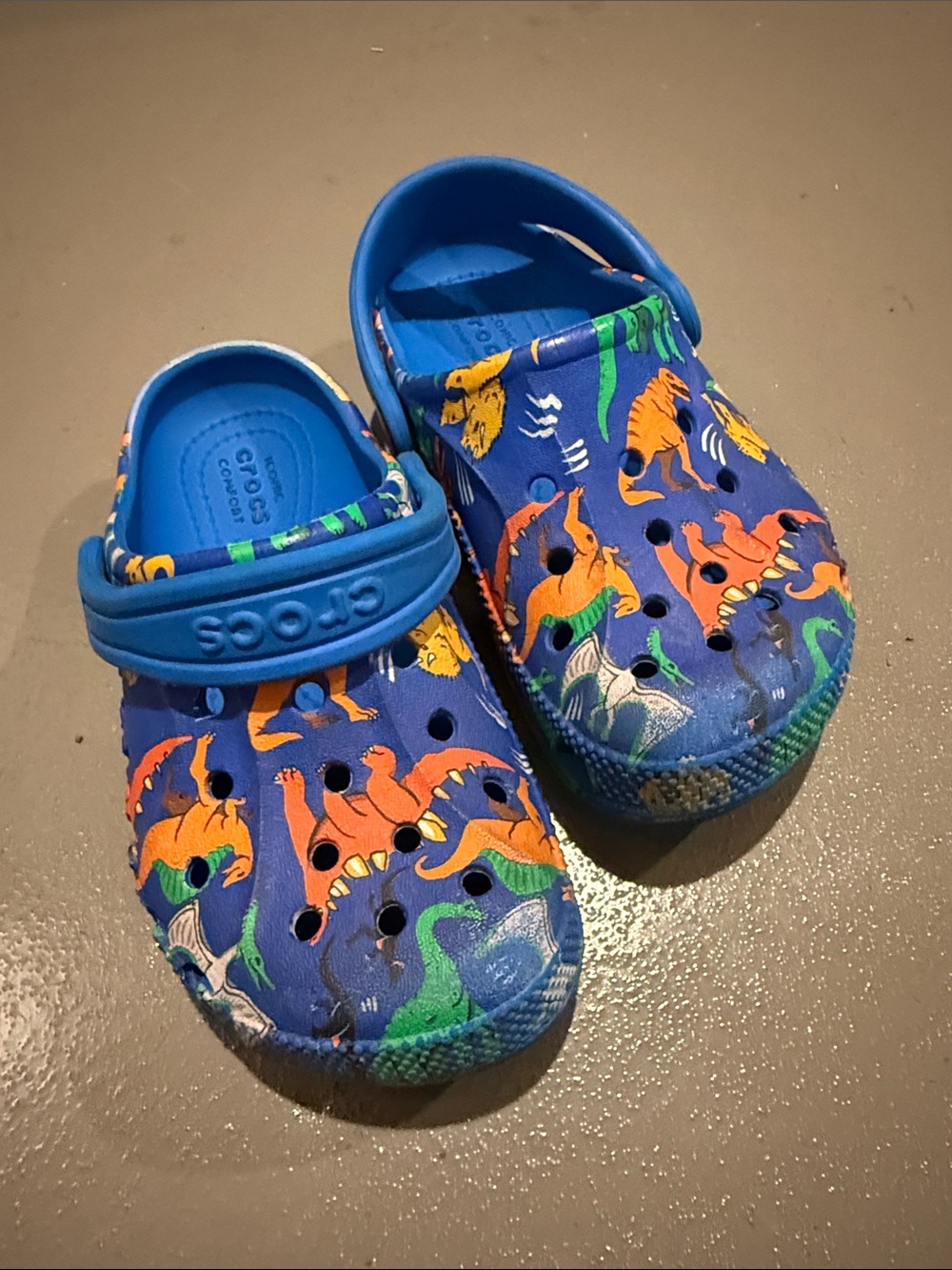 CROCS Kids' Blue Clog with Orange & Green Dinosaur Print